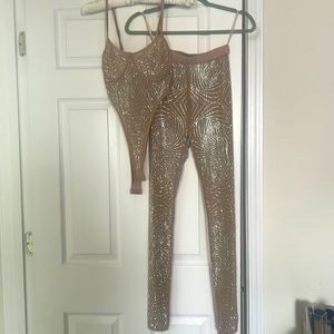 I am selling a two-piece set. The outfit is sheer and has never been worn.